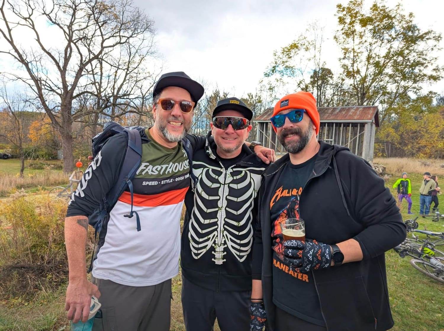 Three of the society standing together after a ride